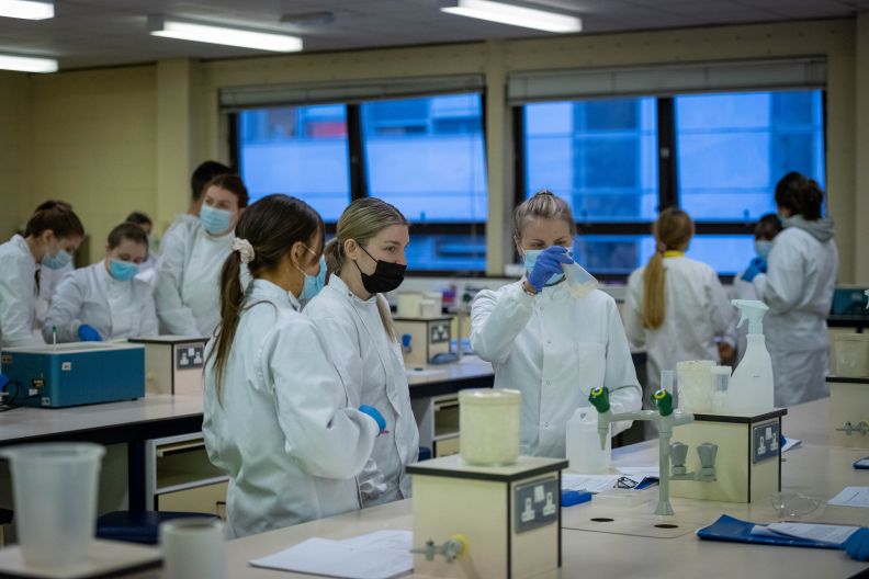 A group of BSc (Hons) Biological Sciences students, working in a lab on Glasgow campus. Photo taken in December 2021. 

On right is Katy Stirling (holding flask).