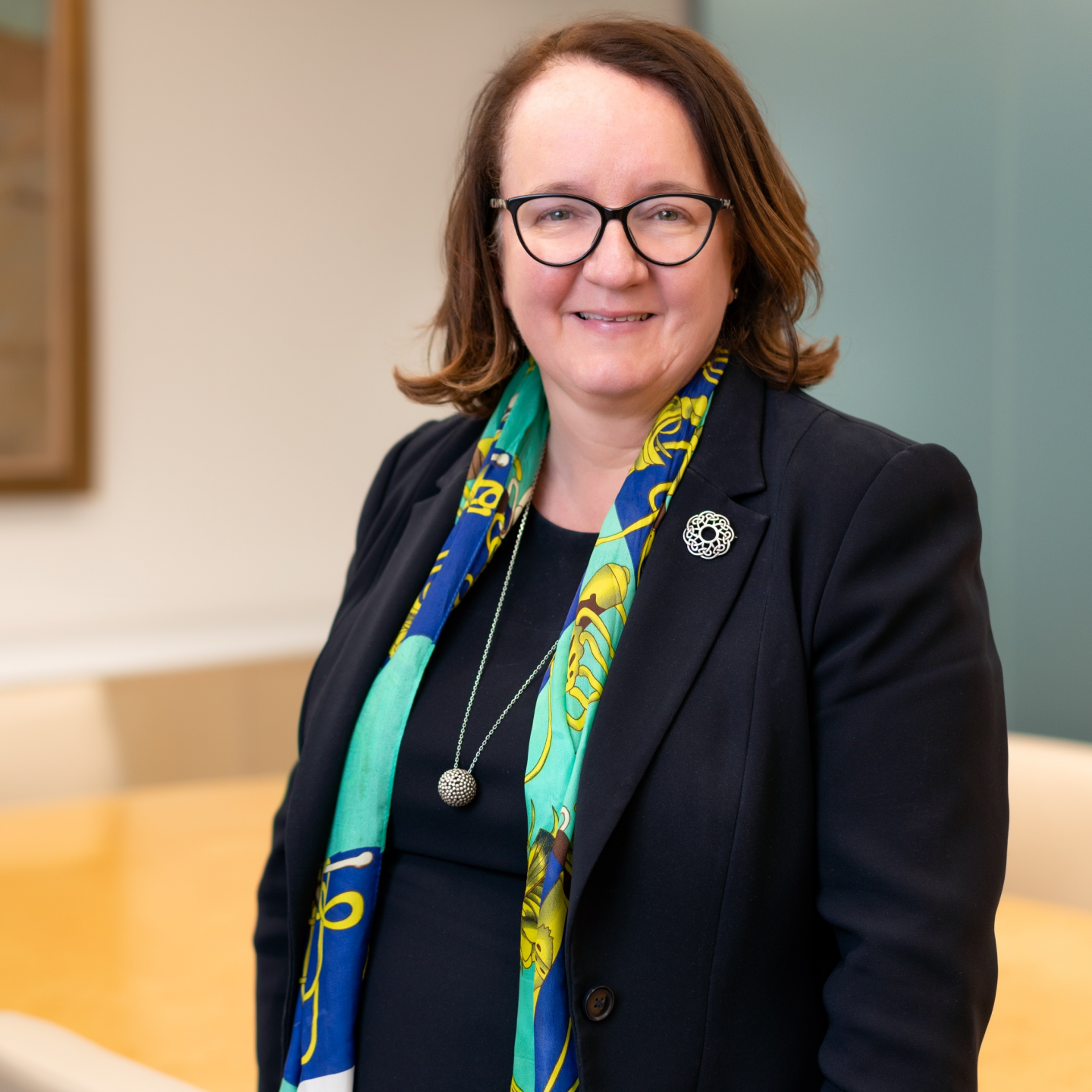 An image of Katie Murray, a GCU alumna and Group Chief Financial Officer of NatWest, smiling.