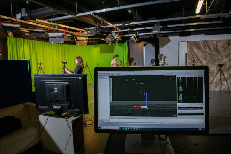 Charlotte Henderson and Bobbi-Joe Ferguson, BSc (Hons) Applied Computer Games students, working in a filming studio on Glasgow campus. Photo taken in November 2021.