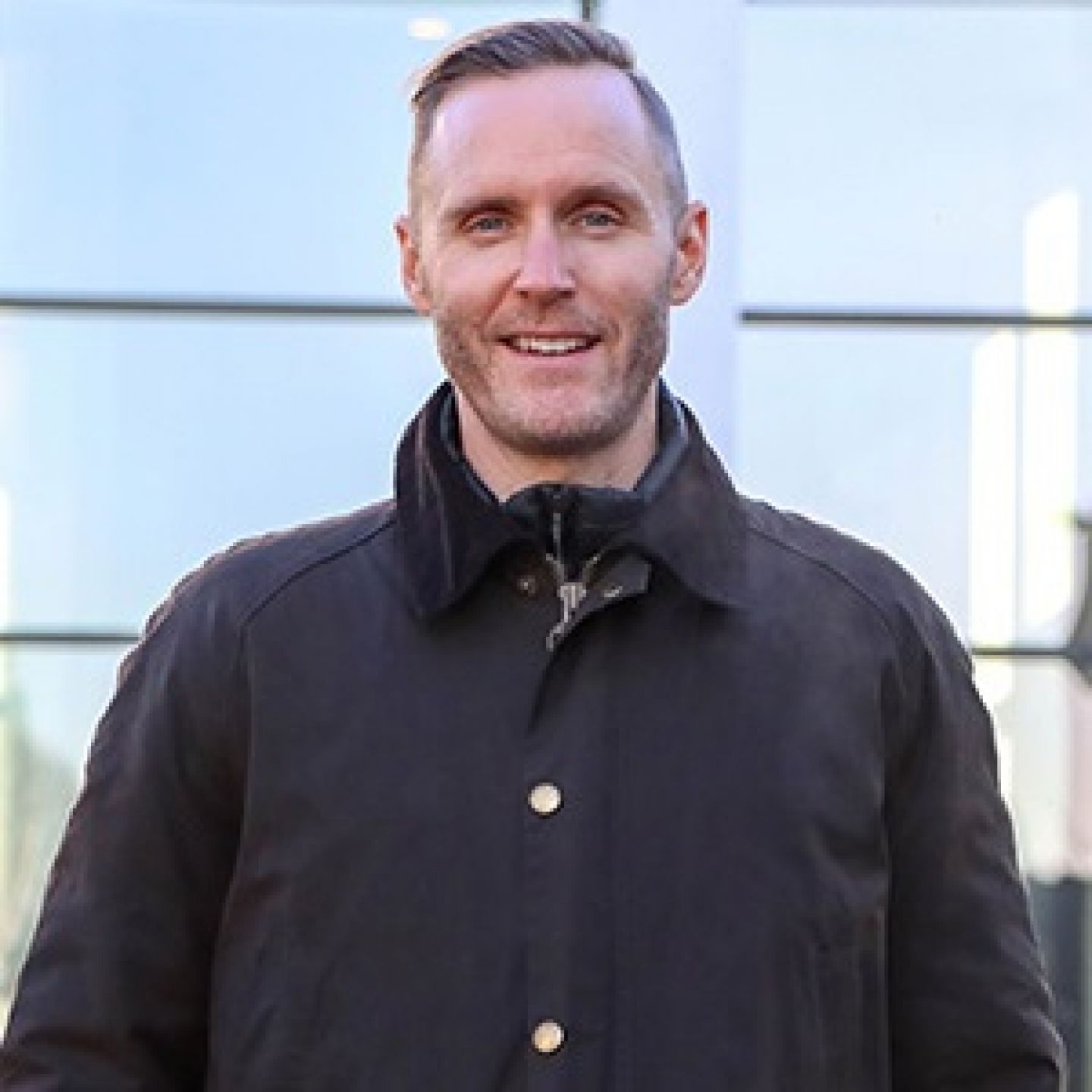 A square image of Stephen Clark, GCU alumnus, graduate and Global Senior Director of Jordan at Nike on the GCU campus grounds.