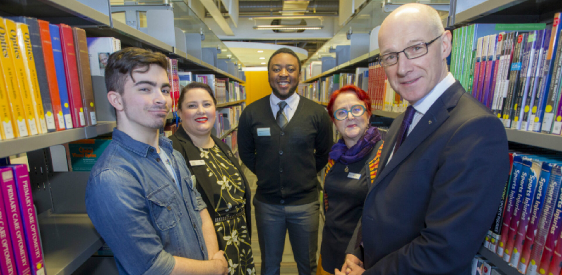May, pictured second right with students and staff and Deputy First Minister and Education Secretary John Swinney during a visit to the Hub.