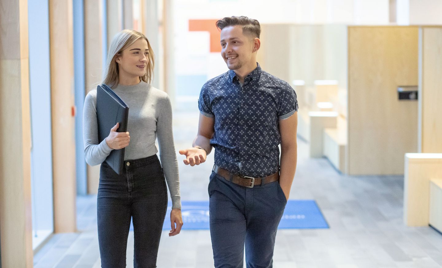 Two BA (Hons) International Business students walking on Glasgow campus in November 2018.