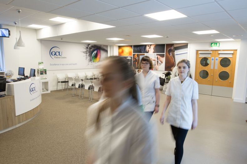 Glasgow Caledonian University students walking through Vision Centre