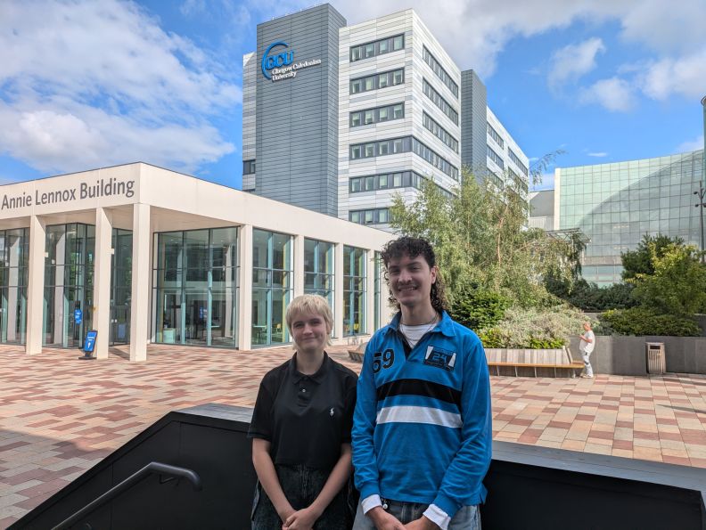 A photo of Louise and Donald on GCU campus grounds. 