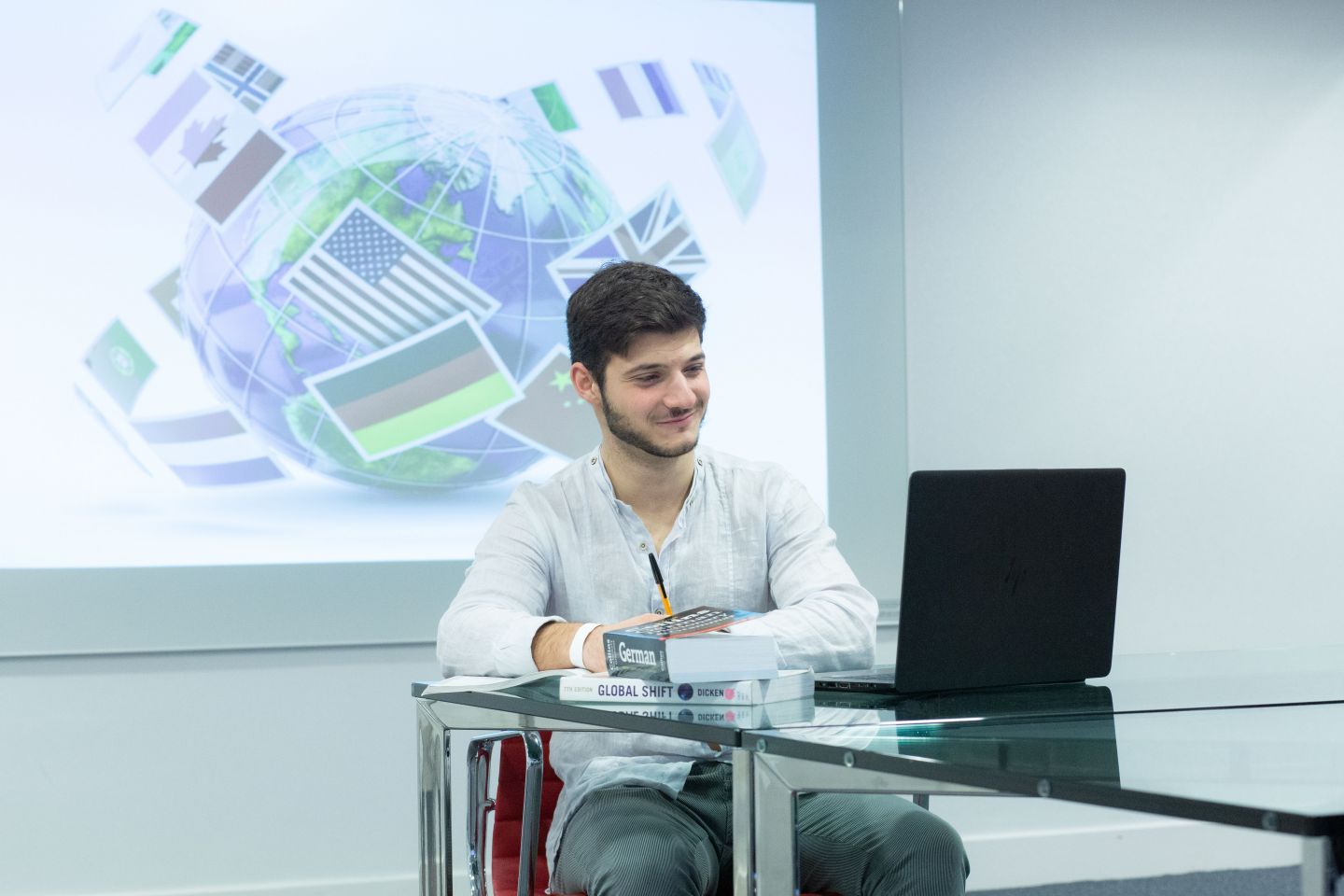 A student studying BA (Hons) International Business with Languages, photographed on Glasgow campus.