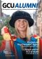A portrait version of the front cover of the GCU Alumni magazine 2022, featuring an image of Alumna and Honorary Graduate and Olympic gold medallist Dr Vicky Wright MBE in graduation gown and hat, holding her gold medal.