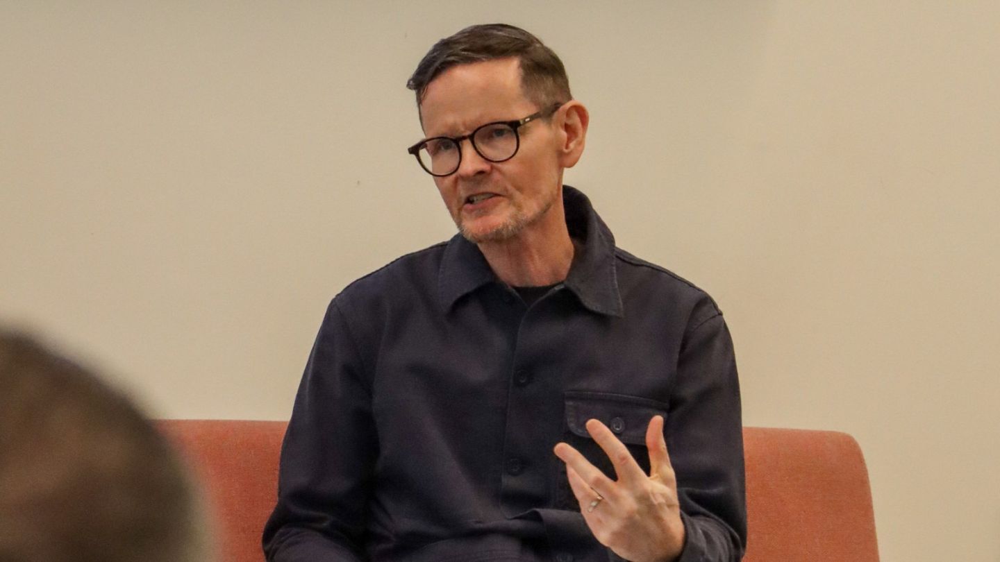 A photo of Anton Lavery hosting a talk
