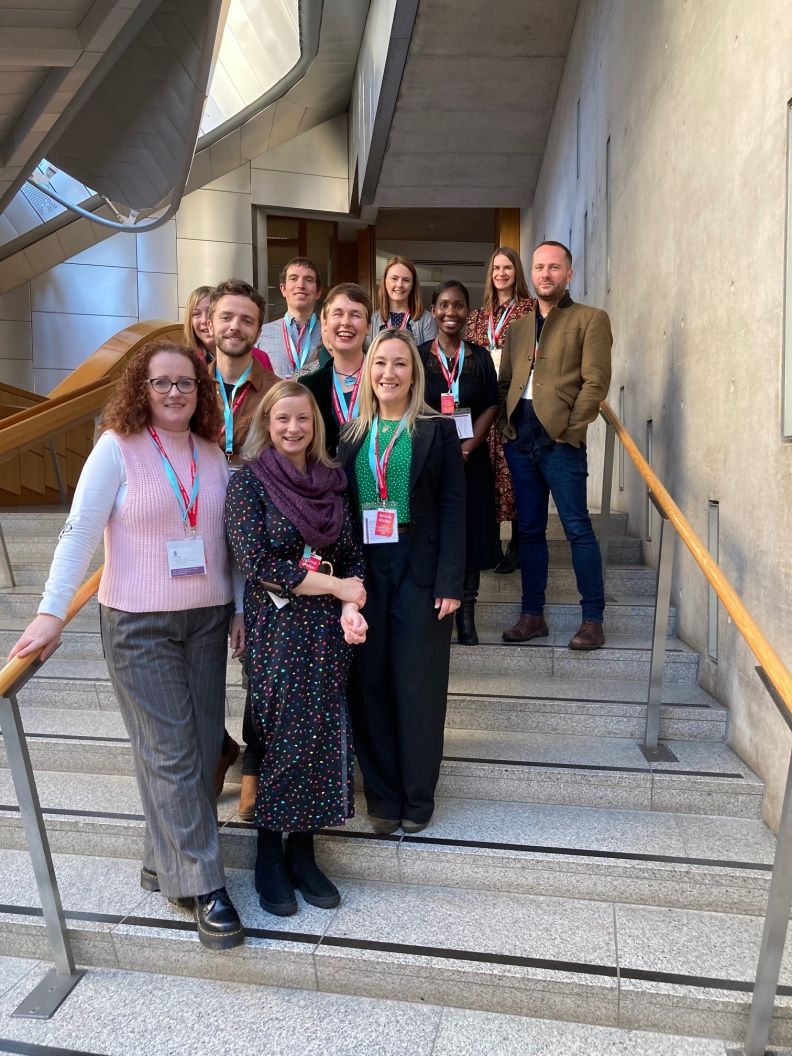 Crucible Programme 2023 cohort on Scottish Parliament stairs