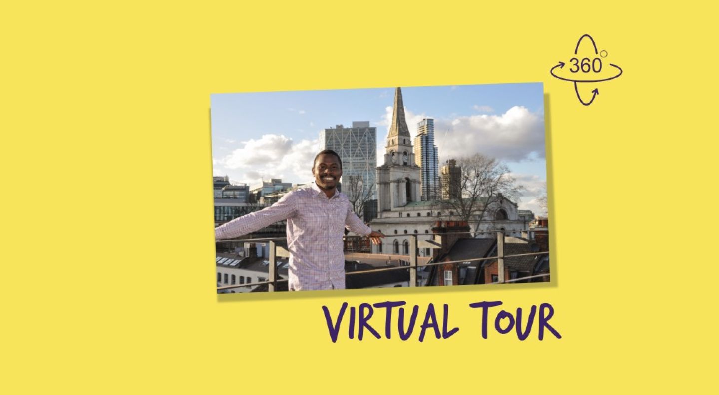 A GCU London student standing in front of London skyline