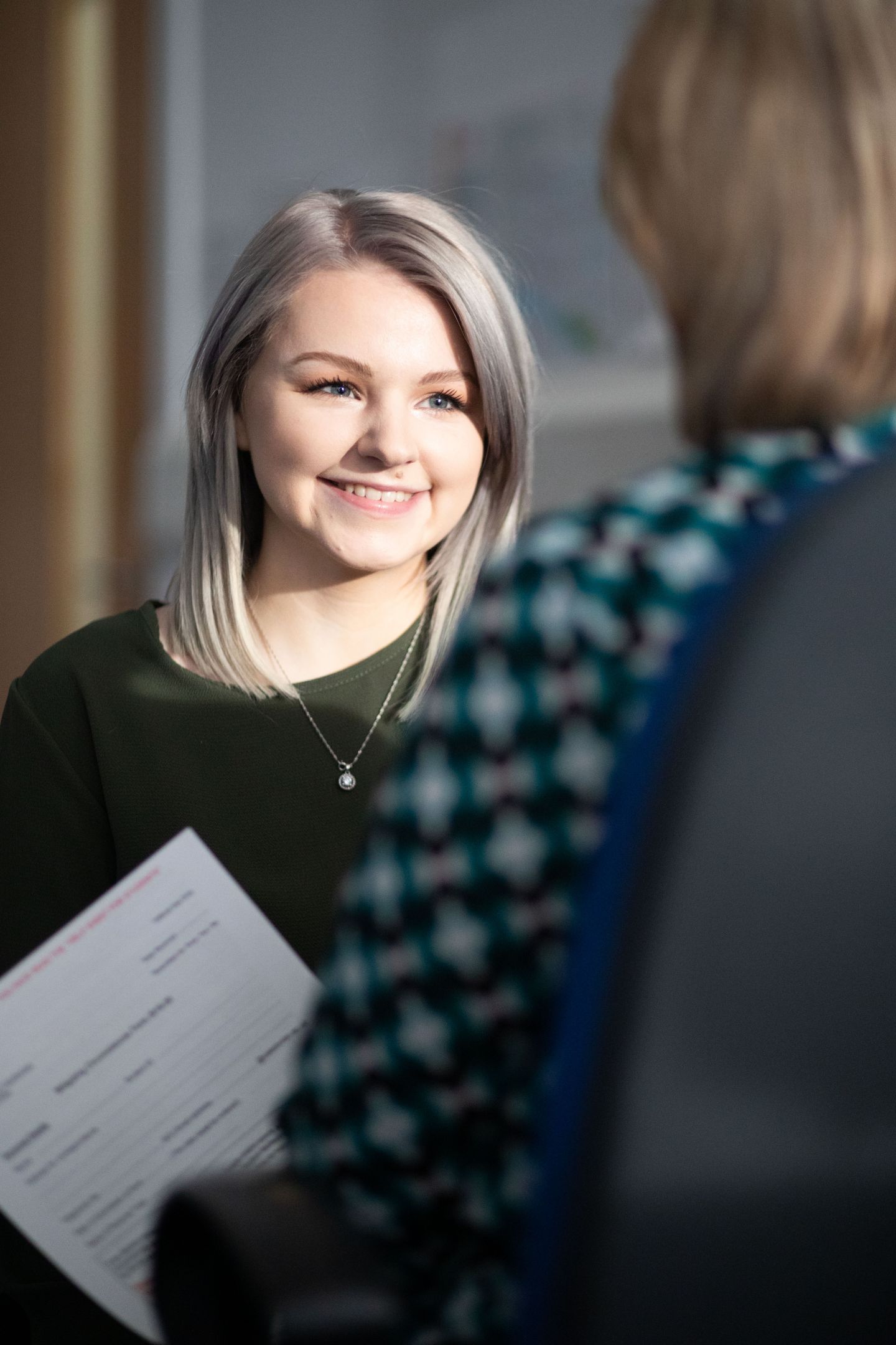 Student sitting with a tutor from the Advice Centre