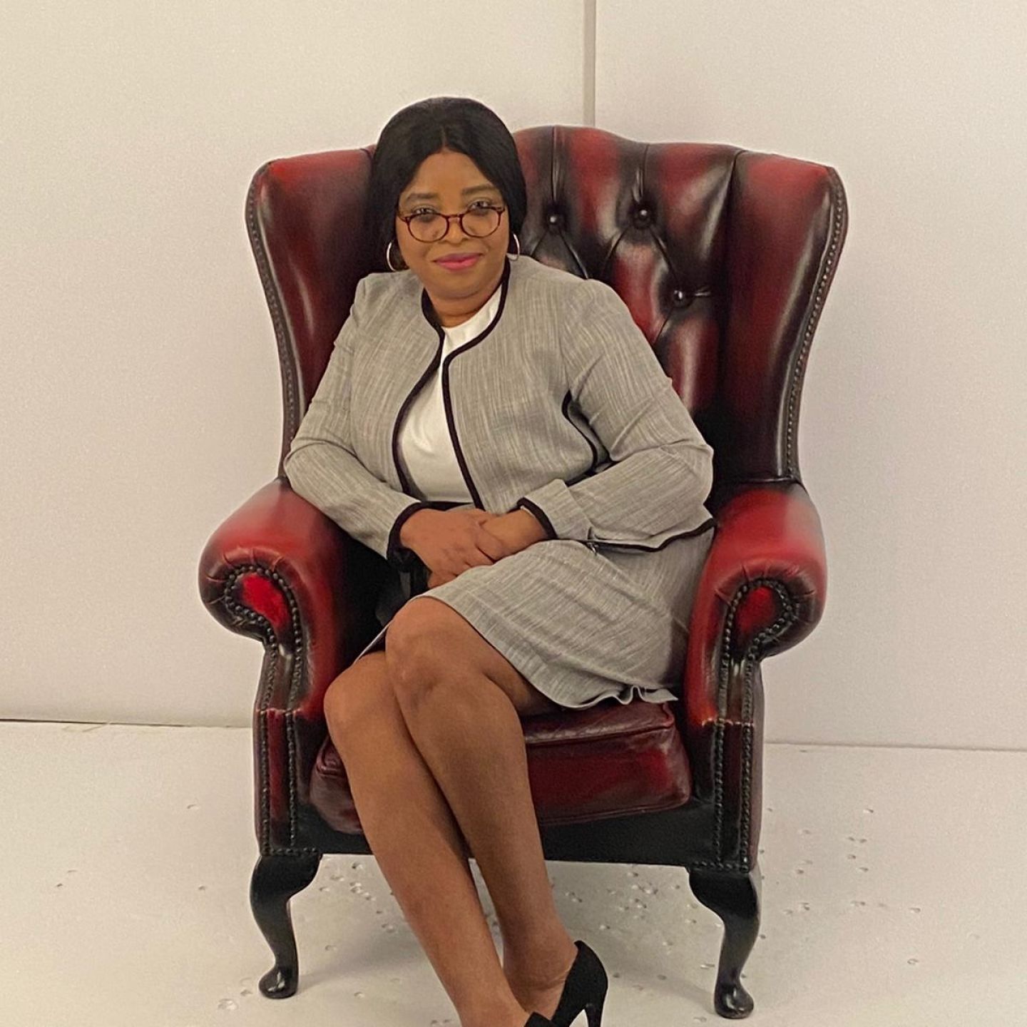 GCU alumna Shulamite Ezechi sitting in a chair