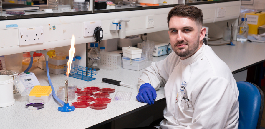 Dr Will Johnston in the bio labs