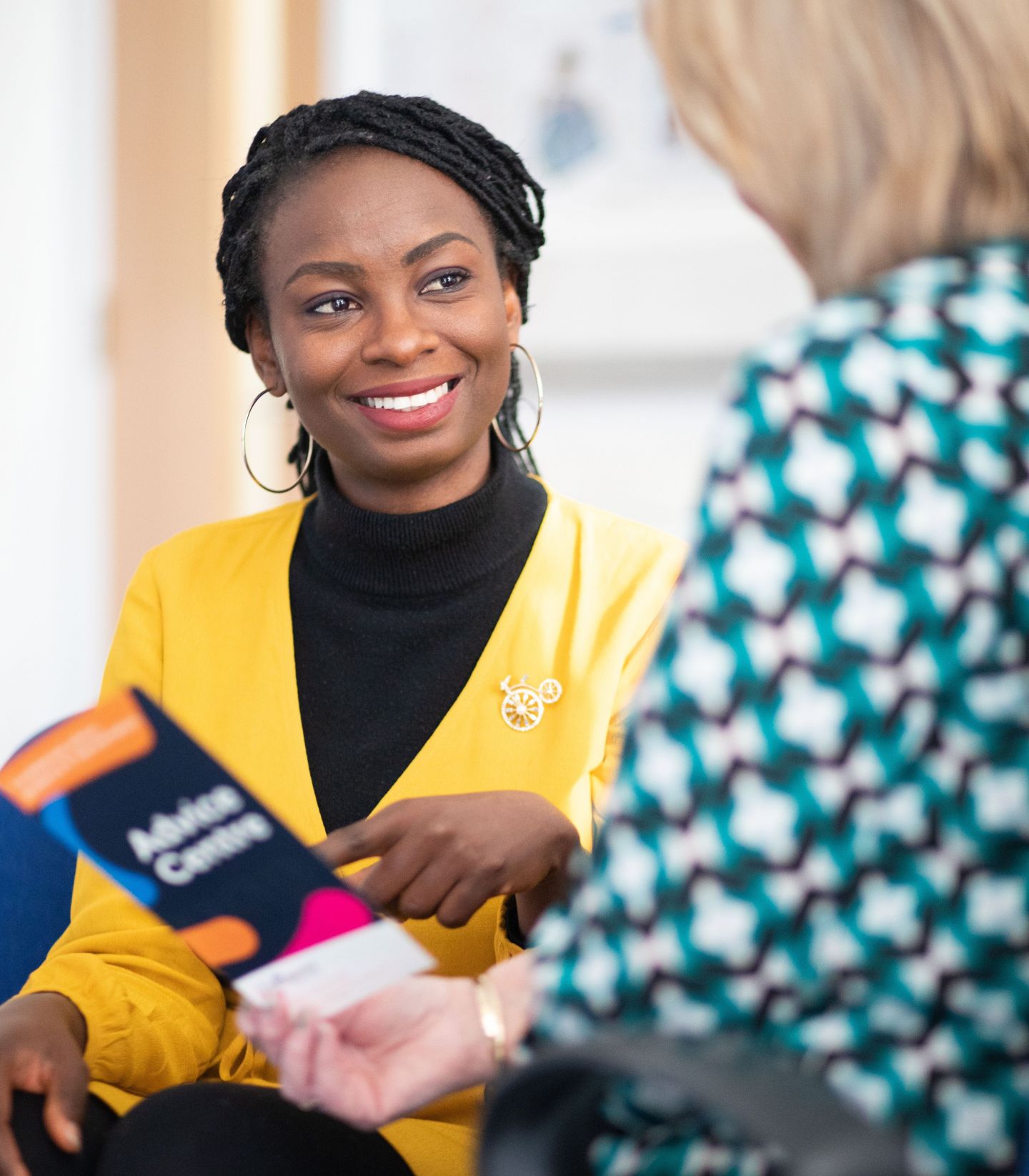 Student sitting with a tutor from the advice centre