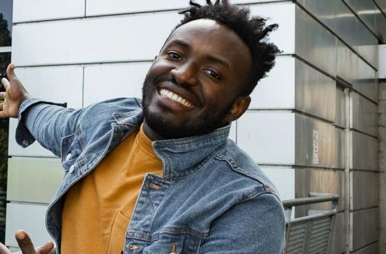 An image of Etienne Kubwabo, a GCU alumnus, and filmmaker and writer, smiling.