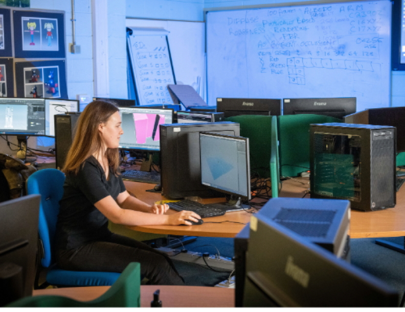 A female at a computer