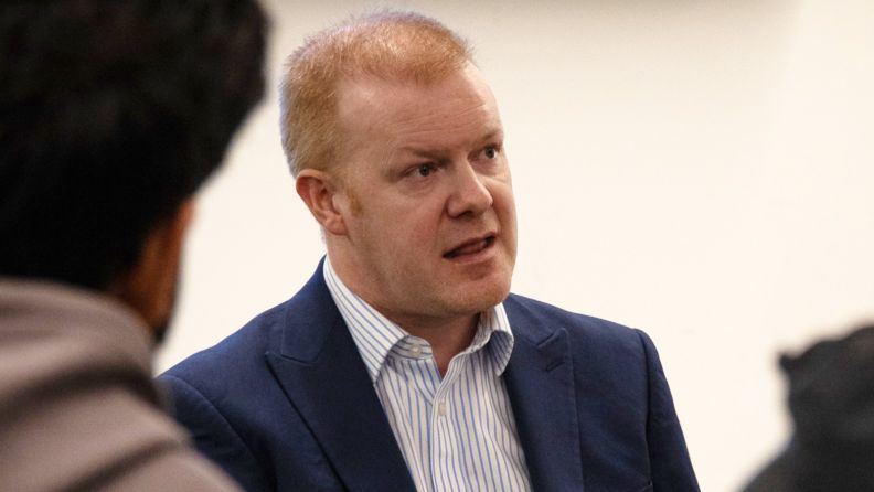 A photo of James McMillan speaking 
