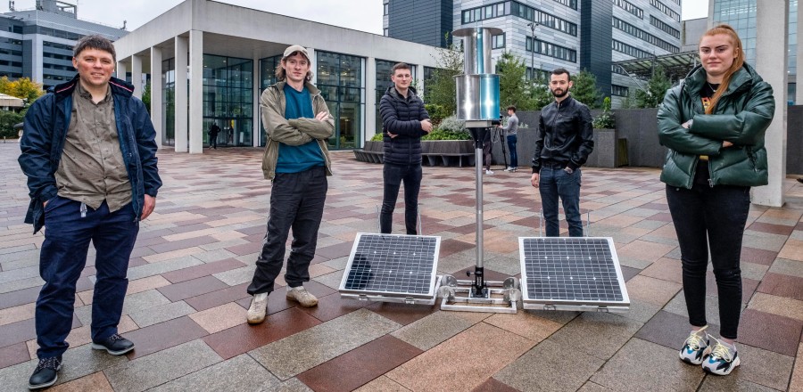 Solar wind turbine and students