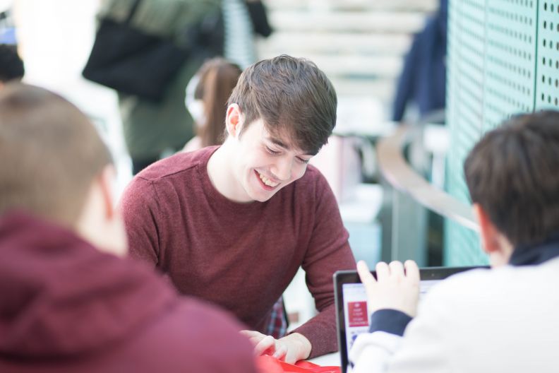 Male student reading